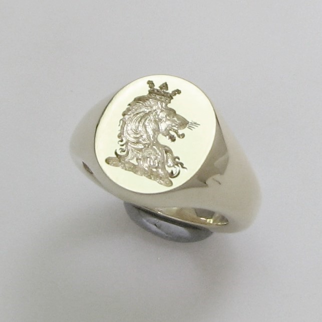 Lion head with crown crest engraved signet ring