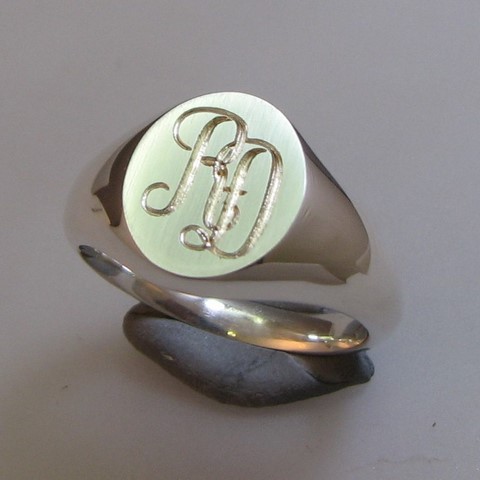 two initiald script engraved signet rings