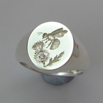 Bumble bee on thistle crest engraved signet ring